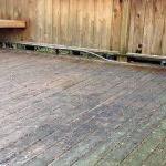 deck cleaning service in grand rapids michigan uses softwashing instead of pressure washing to refinish wood deck